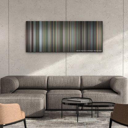 The Mauritanian color palette canvas on a concrete wall above a gray sectional sofa