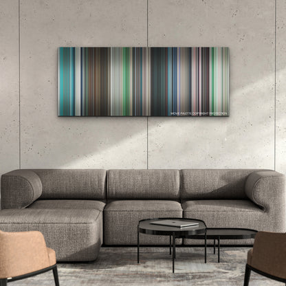 Under Paris color palette canvas on a concrete wall above a gray sectional sofa