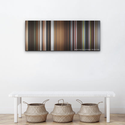 Triangle of Sadness color palette canvas above a white bench with three woven baskets