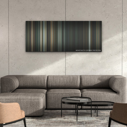 Without Remorse color palette canvas on a concrete wall above a gray sectional sofa