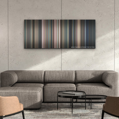 M3GAN color palette canvas on a concrete wall above a gray sectional sofa
