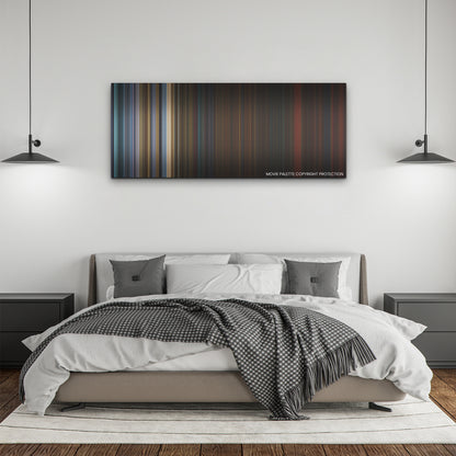 Saw X color palette canvas above a bed, between two black pendant lamps