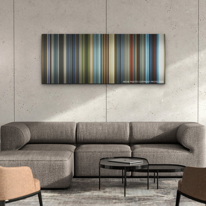 The Tomorrow War color palette canvas on a concrete wall above a gray sectional sofa