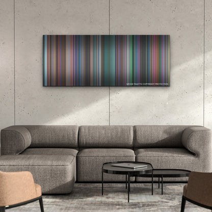 Spirited color palette canvas on a concrete wall above a gray sectional sofa