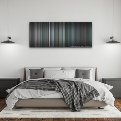 Stowaway color palette canvas above a bed, between two black pendant lamps