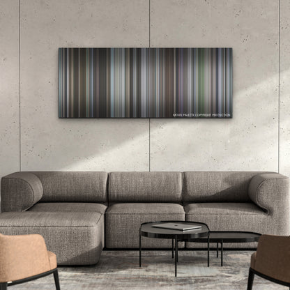 The Worst Person in the World color palette canvas on a concrete wall above a gray sectional sofa