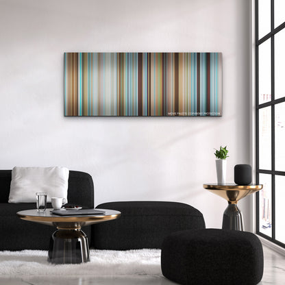 Nyad color palette canvas above a black sofa with a gold-topped table