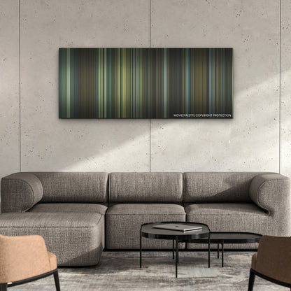The Killer color palette canvas on a concrete wall above a gray sectional sofa
