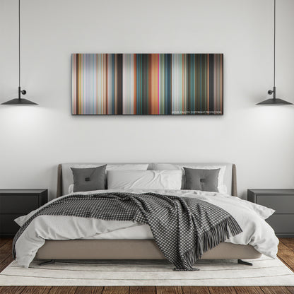 Wicked color palette canvas above a bed, between two black pendant lamps