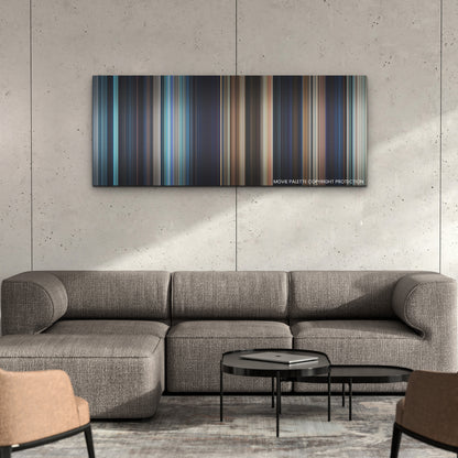 The Little Mermaid color palette canvas on a concrete wall above a gray sectional sofa