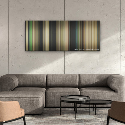 Nope color palette canvas on a concrete wall above a gray sectional sofa