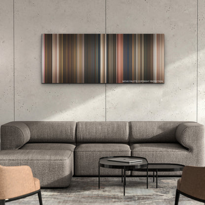 Wonka color palette canvas on a concrete wall above a gray sectional sofa