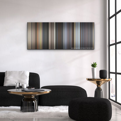 Ghosted color palette canvas above a black sofa with a gold-topped table