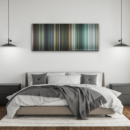 The Suicide Squad color palette canvas above a bed, between two black pendant lamps