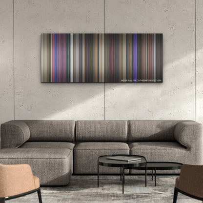 Marry Me color palette canvas on a concrete wall above a gray sectional sofa