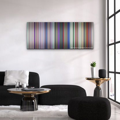 Spellbound color palette canvas above a black sofa with a gold-topped table