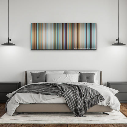 Nyad color palette canvas above a bed, between two black pendant lamps