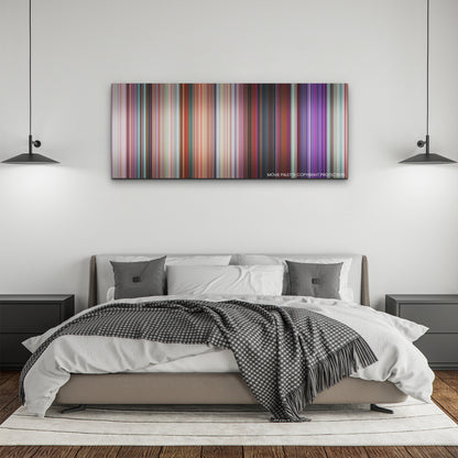 Turning Red color palette canvas above a bed, between two black pendant lamps