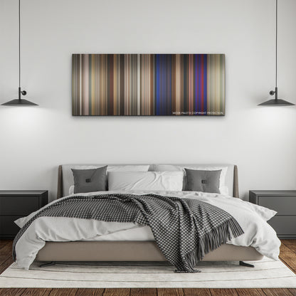 Old Dads color palette canvas above a bed, between two black pendant lamps