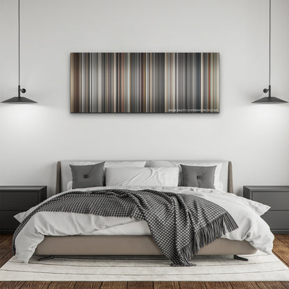 Blonde color palette canvas above a bed, between two black pendant lamps