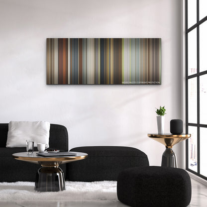 The Harder They Fall color palette canvas above a black sofa with a gold-topped table