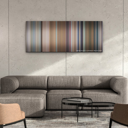 You People color palette canvas on a concrete wall above a gray sectional sofa