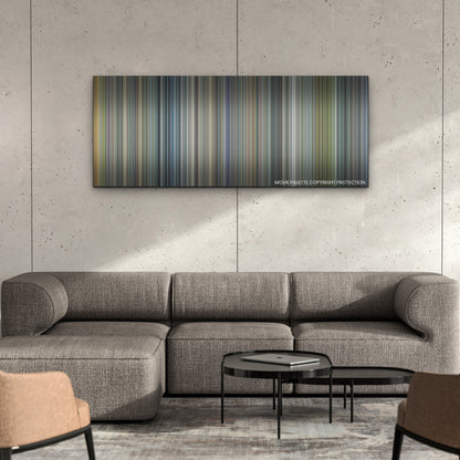 Ambulance color palette canvas on a concrete wall above a gray sectional sofa