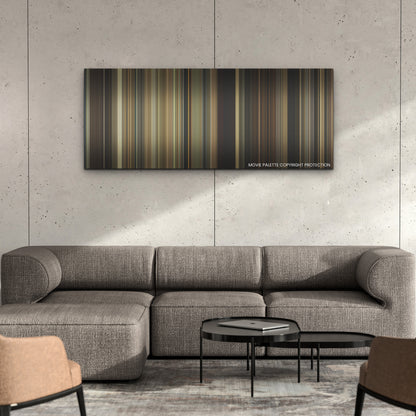 The Bikeriders color palette canvas on a concrete wall above a gray sectional sofa