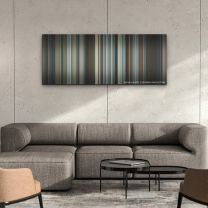 To Catch a Killer color palette canvas on a concrete wall above a gray sectional sofa