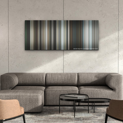 Road House color palette canvas on a concrete wall above a gray sectional sofa