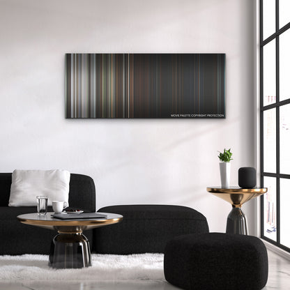 X color palette canvas above a black sofa with a gold-topped table