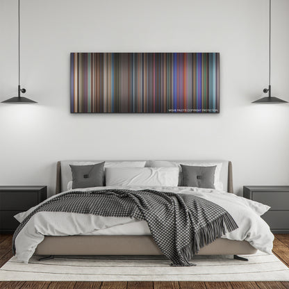Elvis color palette canvas above a bed, between two black pendant lamps