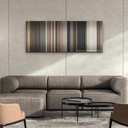 Finch color palette canvas on a concrete wall above a gray sectional sofa