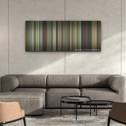 A Good Person color palette canvas on a concrete wall above a gray sectional sofa