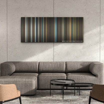 Watcher color palette canvas on a concrete wall above a gray sectional sofa