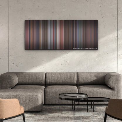 See How They Run color palette canvas on a concrete wall above a gray sectional sofa