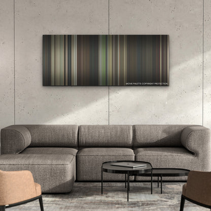 The Night House color palette canvas on a concrete wall above a gray sectional sofa