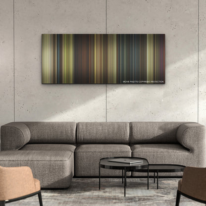 A Quiet Place Part II color palette canvas on a concrete wall above a gray sectional sofa