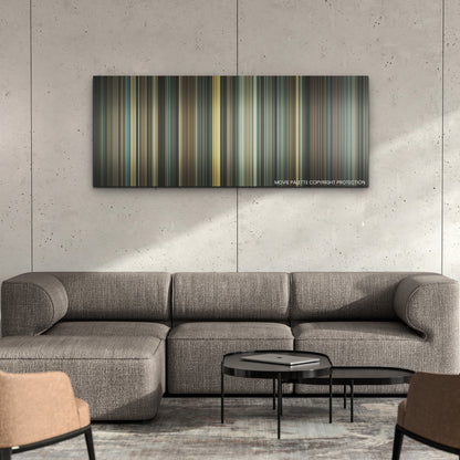 The Fabelmans color palette canvas on a concrete wall above a gray sectional sofa