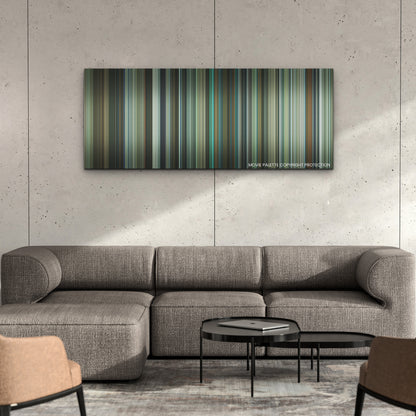 Deep Water color palette canvas on a concrete wall above a gray sectional sofa