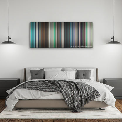 Under Paris color palette canvas above a bed, between two black pendant lamps