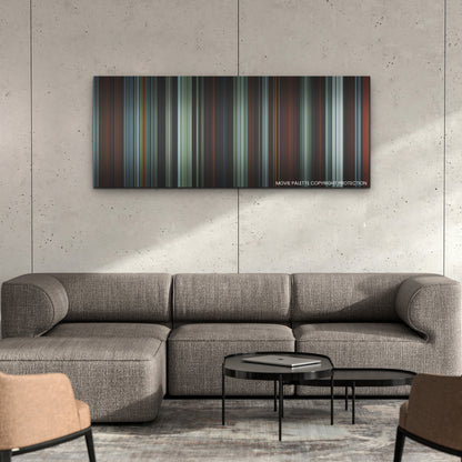 The Northman color palette canvas on a concrete wall above a gray sectional sofa