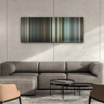Transformers: Rise of the Beasts color palette canvas on a concrete wall above a gray sectional sofa