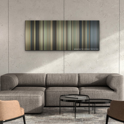 King Richard color palette canvas on a concrete wall above a gray sectional sofa