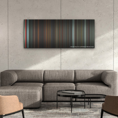 Longlegs color palette canvas on a concrete wall above a gray sectional sofa