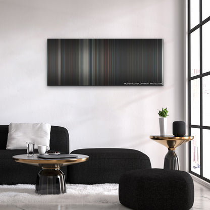 Hellraiser color palette canvas above a black sofa with a gold-topped table