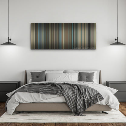 One Life color palette canvas above a bed, between two black pendant lamps
