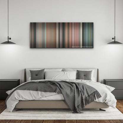 Bottoms color palette canvas above a bed, between two black pendant lamps