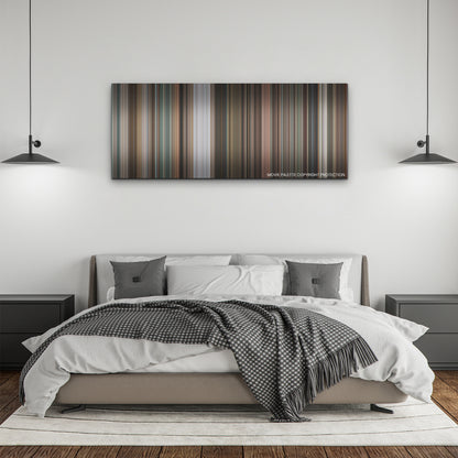 Dream Scenario color palette canvas above a bed, between two black pendant lamps