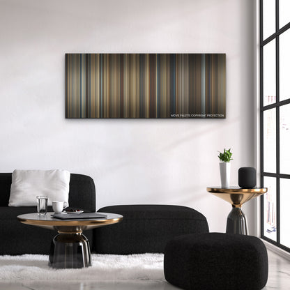Gladiator II color palette canvas above a black sofa with a gold-topped table
